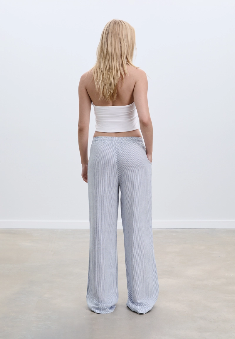 Длинные свободные брюки в полоску с льняной тканью