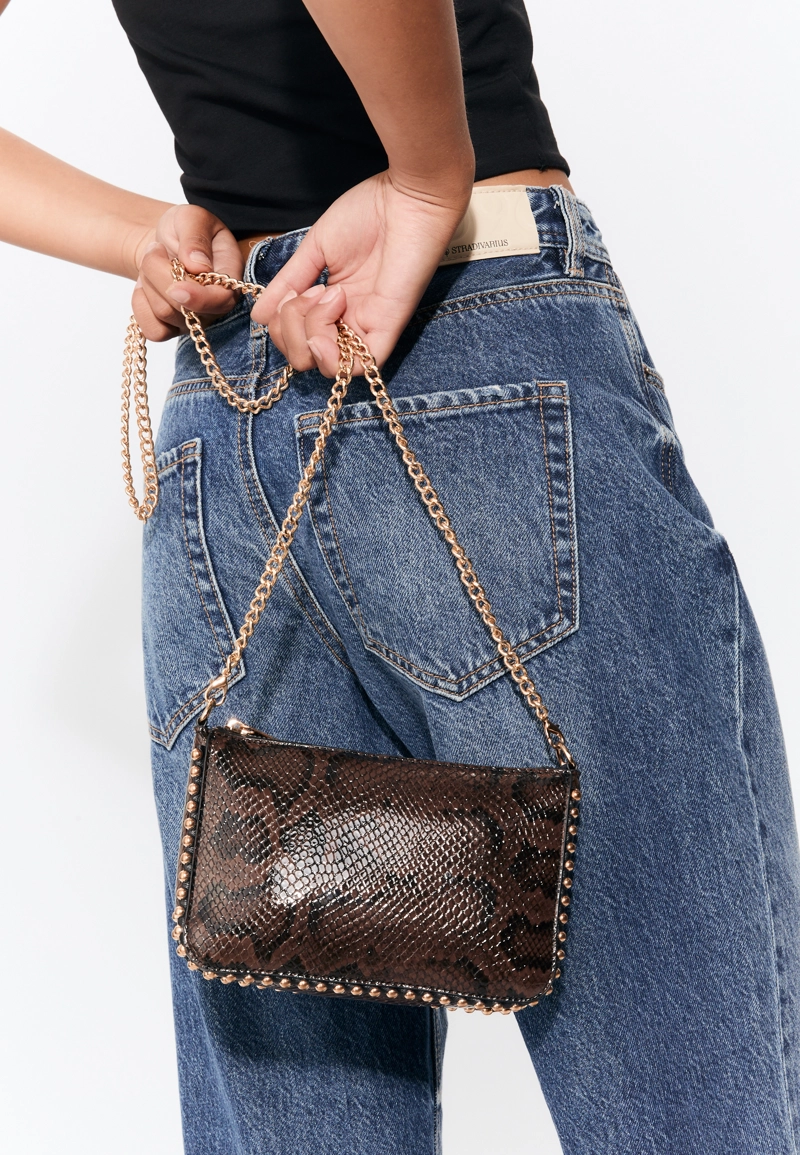 Мини-сумочка в горошек с анималистическим принтом