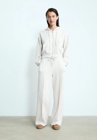 Брюки свободного кроя с мягкими нервами- Заказать в России