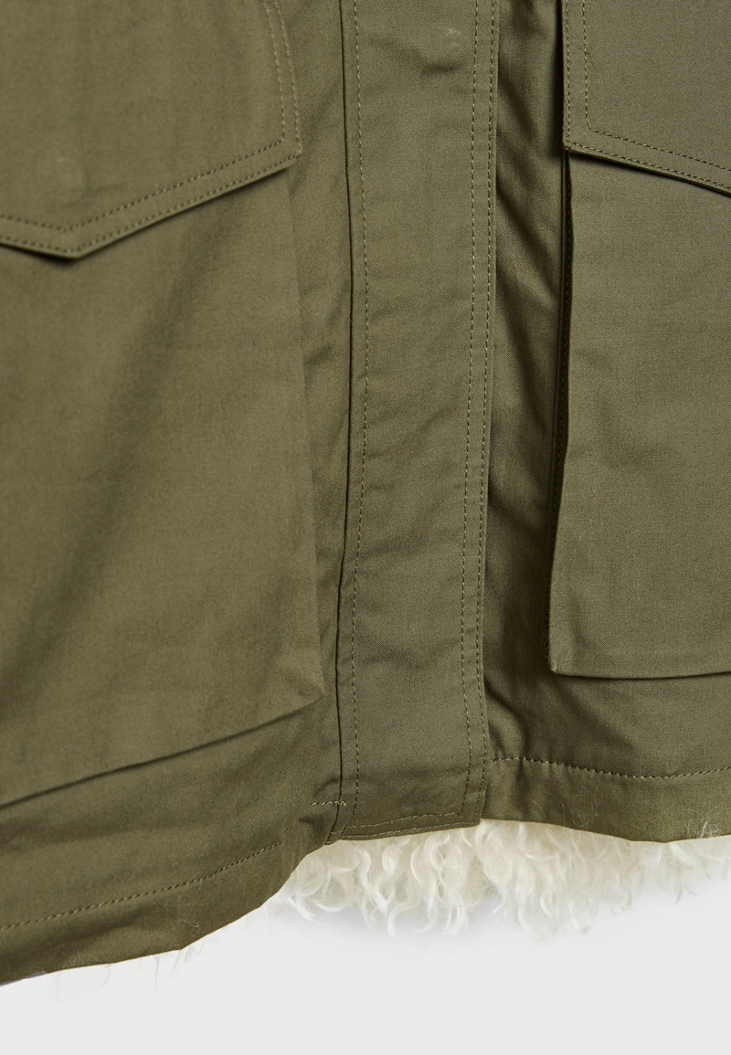 Парка стеганая с длинным искусственным мехом внутри