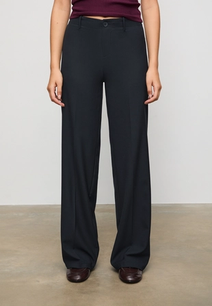 Классические брюки свободного кроя- Заказать в России