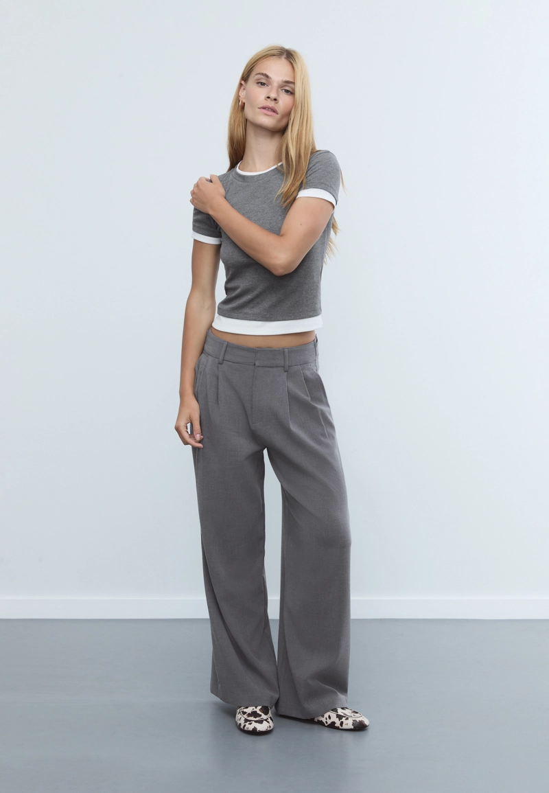 Регулируемые брюки очень широкого кроя