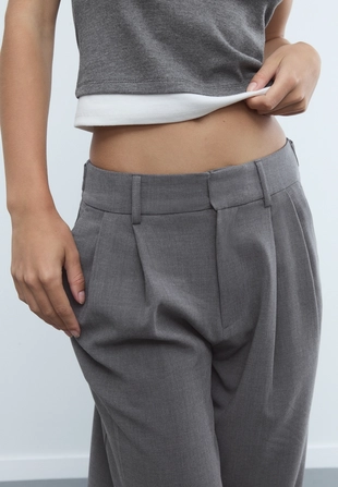 Регулируемые брюки очень широкого кроя- Заказать в России
