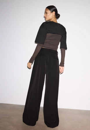 Классические брюки широкого кроя с защипами- Заказать в России