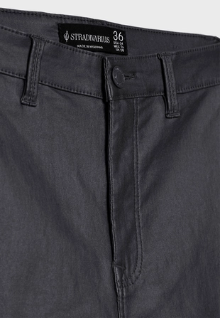 Брюки с вощеным покрытием и очень высокой посадкой- Заказать в России