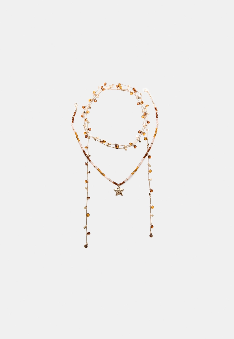 Набор из 2 ожерелий с бусинами и звездой