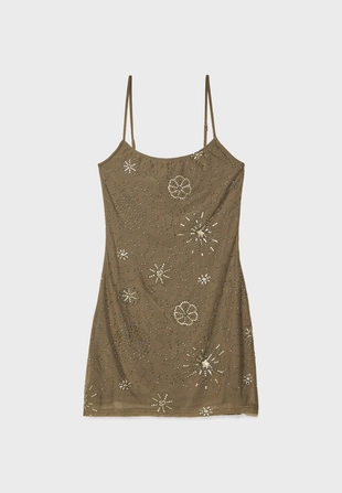 Короткое платье из полупрозрачной ткани с блестящей отделкой- Заказать в России