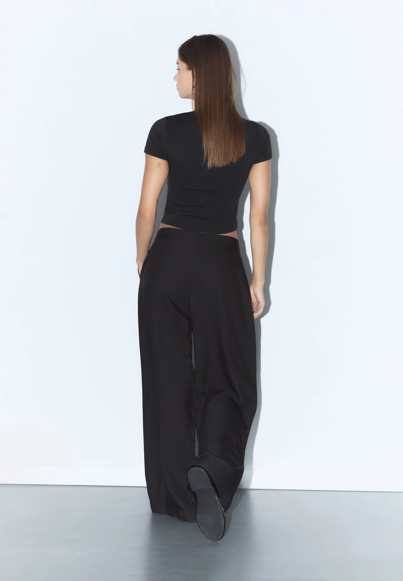 Повседневные брюки в полоску с перекрестной талией