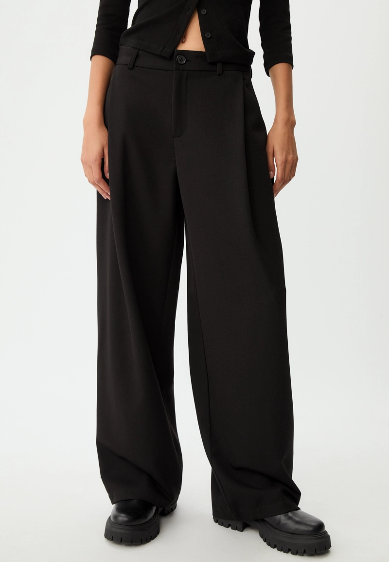 Классические брюки с защипами