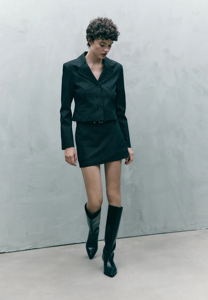 Мини-юбка в полоску с ремнями