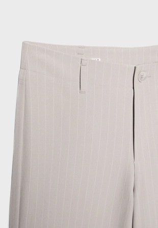 Классические зауженные брюки в полоску- Заказать в России