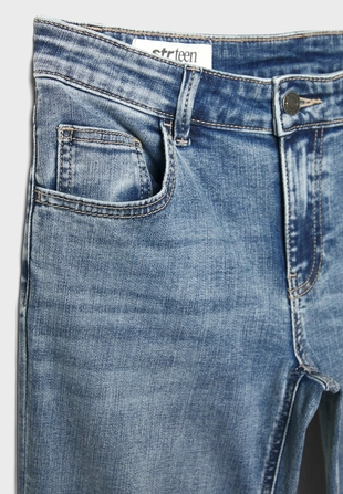 Джинсы клеш с низкой посадкой- Заказать в России