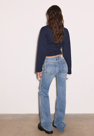 Джинсы клеш с низкой посадкой- Заказать в России