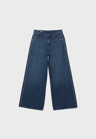 Джинсы свободного кроя с заклепками в виде сердечек- Заказать в России