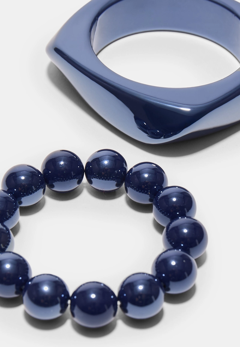 Набор из 2 браслетов: с бусинами и жесткий