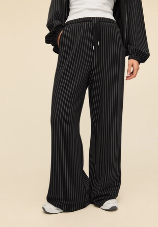 Брюки-джоггеры палаццо, мягкие на ощупь- Заказать в России