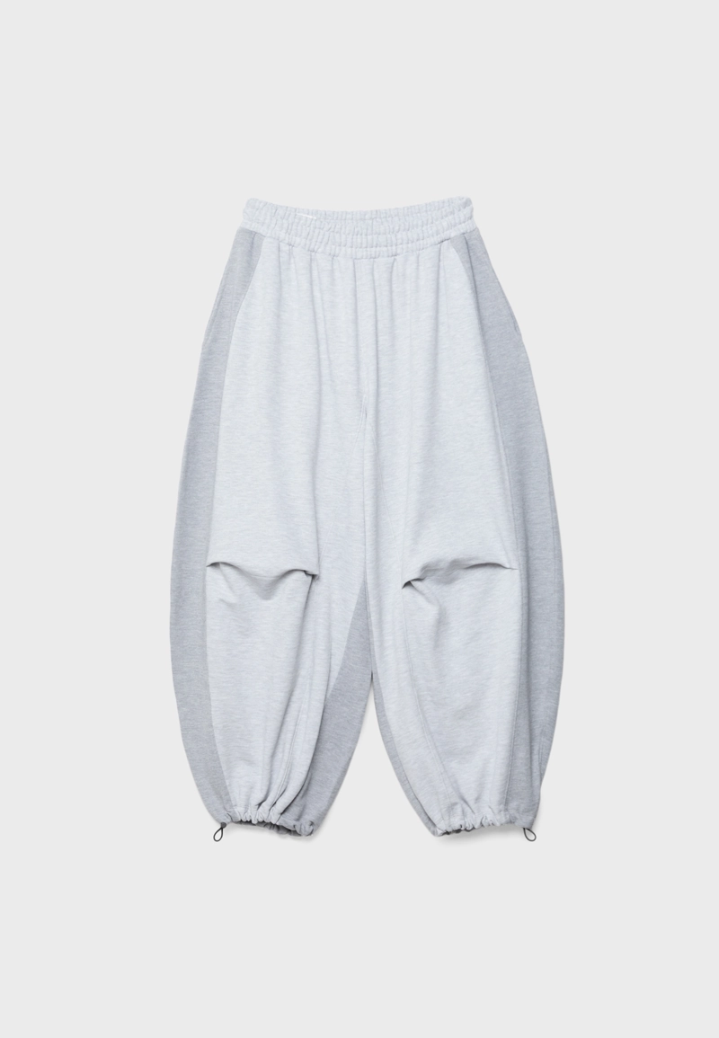 Брюки-джоггеры шароварного кроя со стопперами