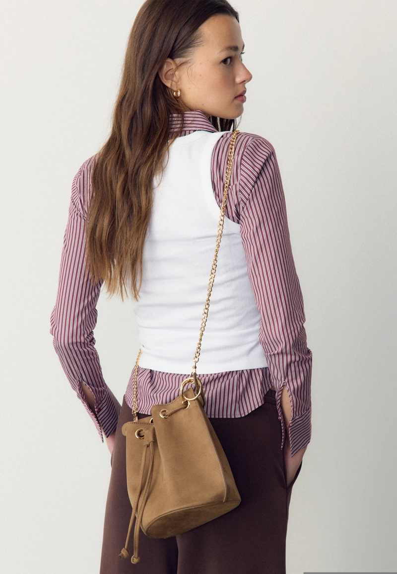 Жесткая сумка-бочонок с люверсами