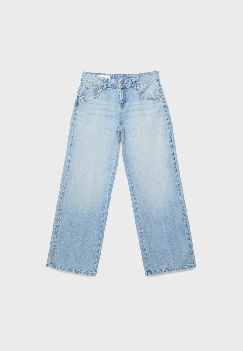 Джинсы свободного кроя с заклепками