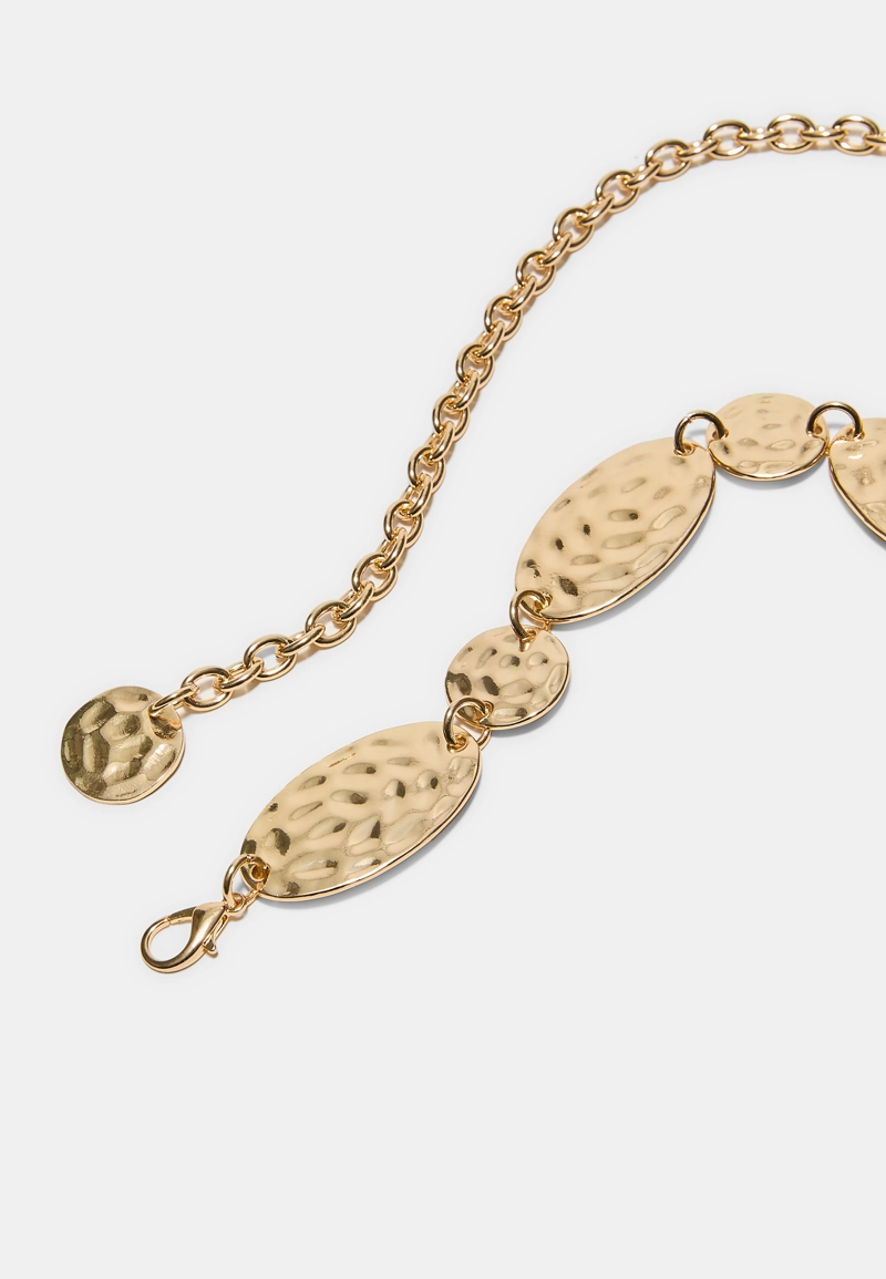 Металлический ремень с овальными монетами