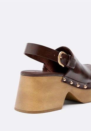 Сабо на платформе с заклепками- Заказать в России