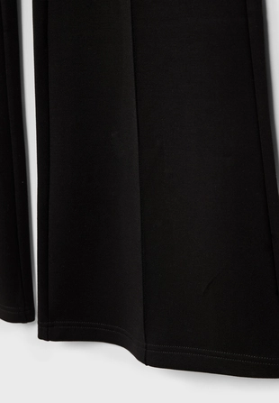 Брюки клеш с мягкой фактурой и отделкой- Заказать в России