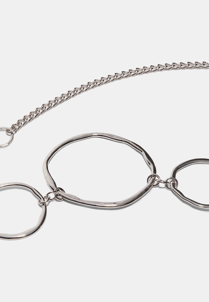 Металлический ремень с крупными овалами