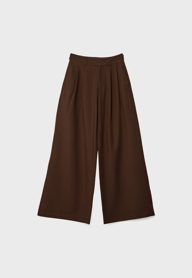 Регулируемые брюки очень широкого кроя