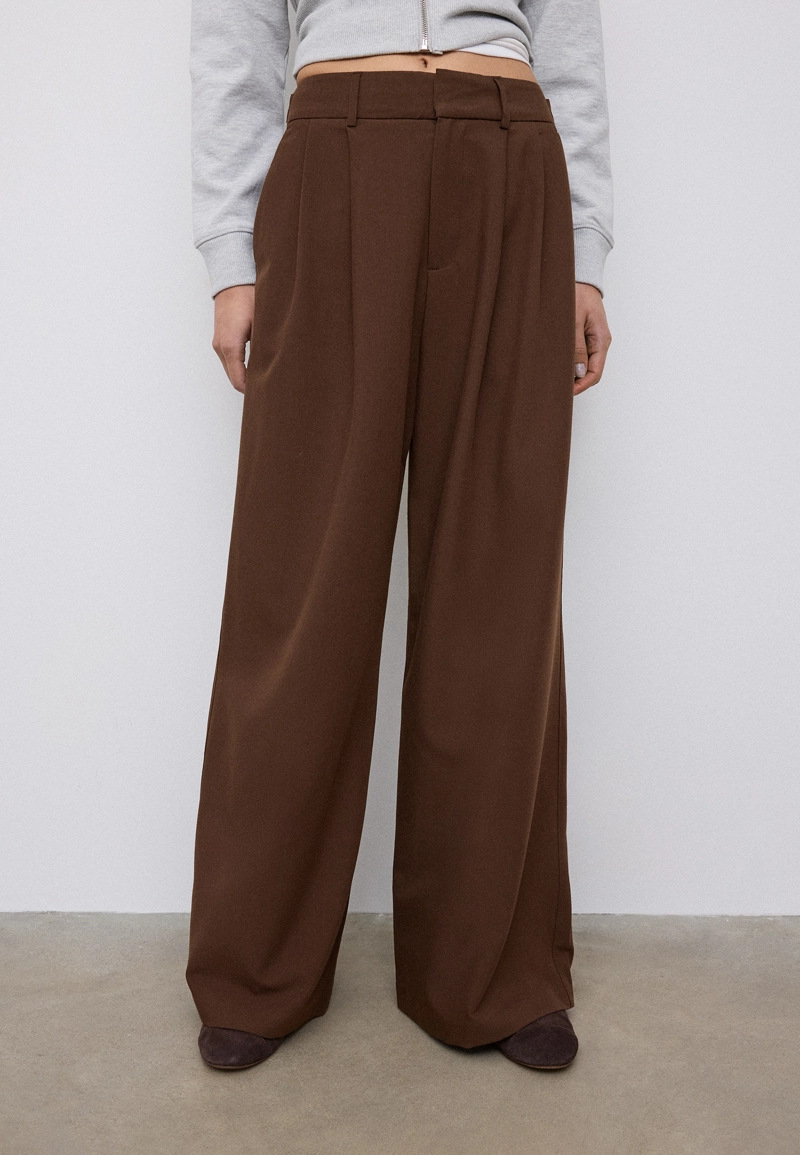 Регулируемые брюки очень широкого кроя