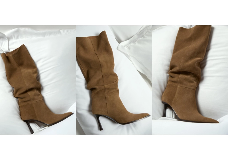 Высокие кожаные сапоги свободного кроя на каблуке