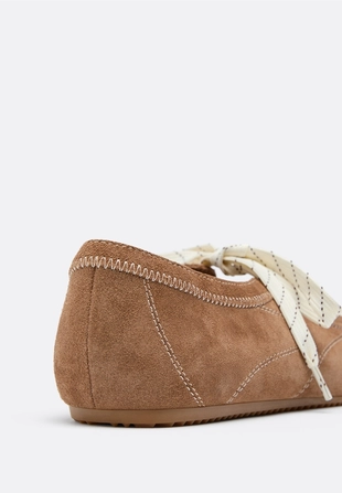 Leather bow sneakers- Заказать в России