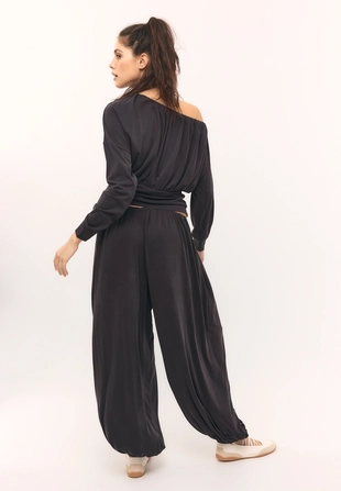 Брюки-баллон из мягкой струящейся ткани- Заказать в России