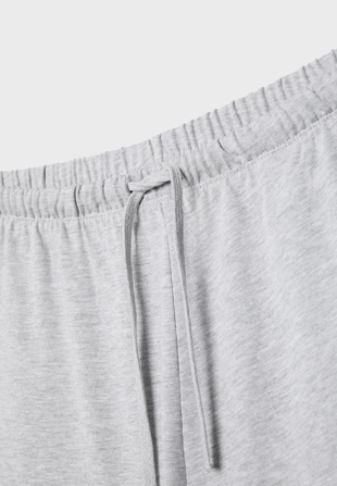 Брюки-джоггеры свободного кроя- Заказать в России