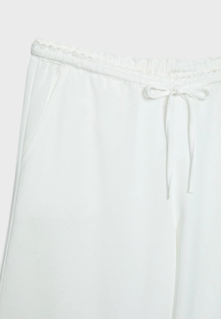 Брюки свободного кроя под лен- Заказать в России