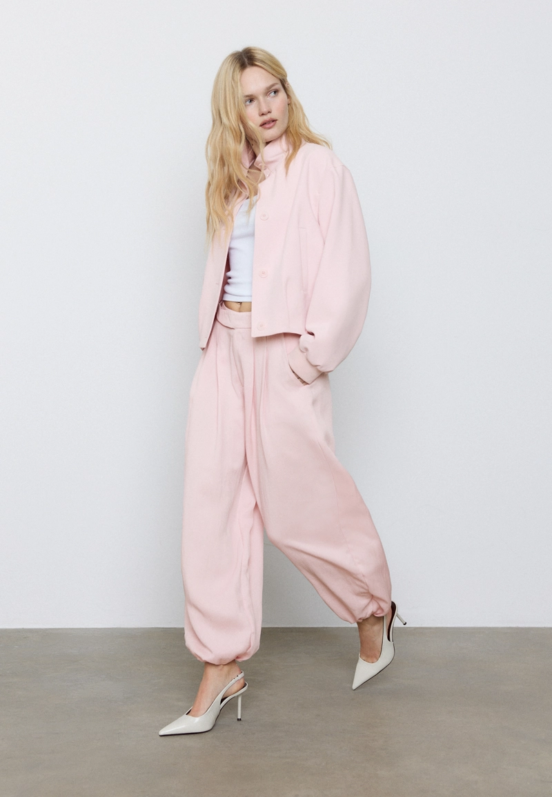 Брюки-шаровары с защипами и пряжкой