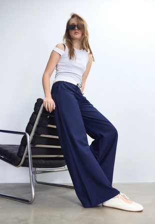 Брюки свободного кроя под лен- Заказать в России