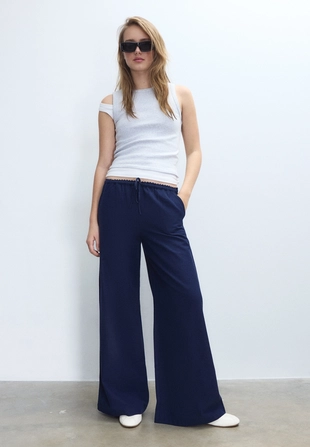 Брюки свободного кроя под лен- Заказать в России