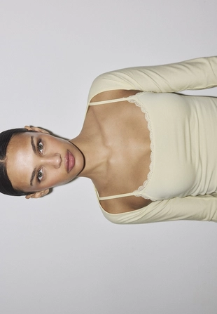 Болеро зауженного кроя с длинными рукавами- Заказать в России