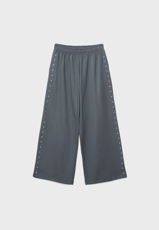 Брюки из футера с заклепками- Заказать в России