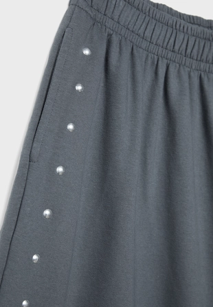 Брюки из футера с заклепками- Заказать в России