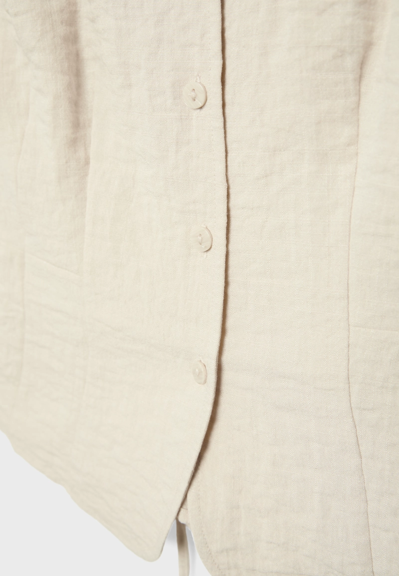 Жилет на пуговицах