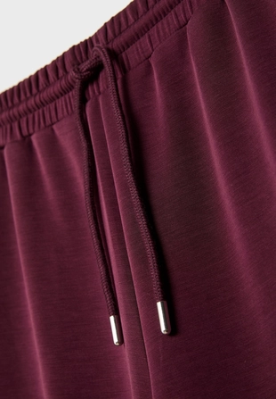 Брюки-джоггеры палаццо, мягкие на ощупь- Заказать в России