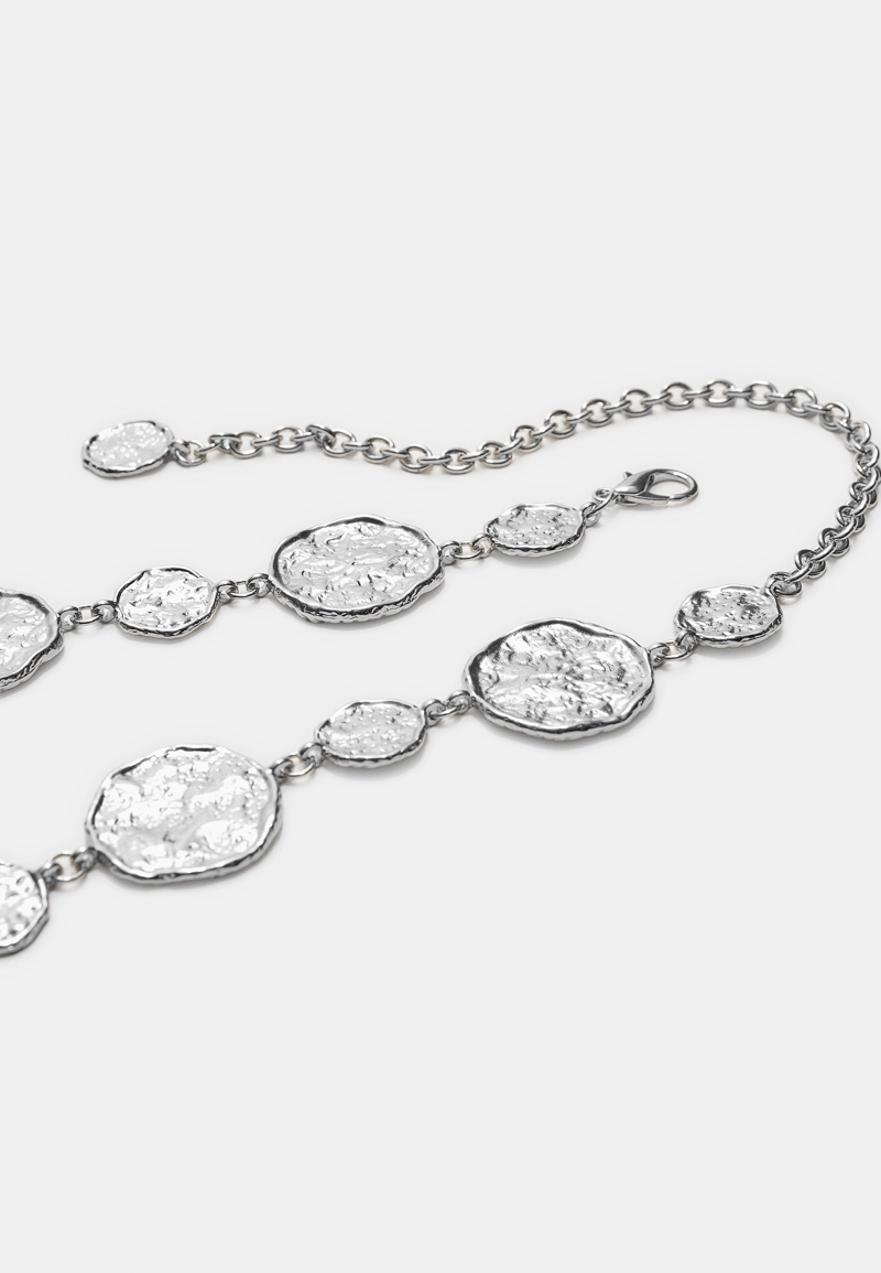 Металлический ремень с круглыми пластинами