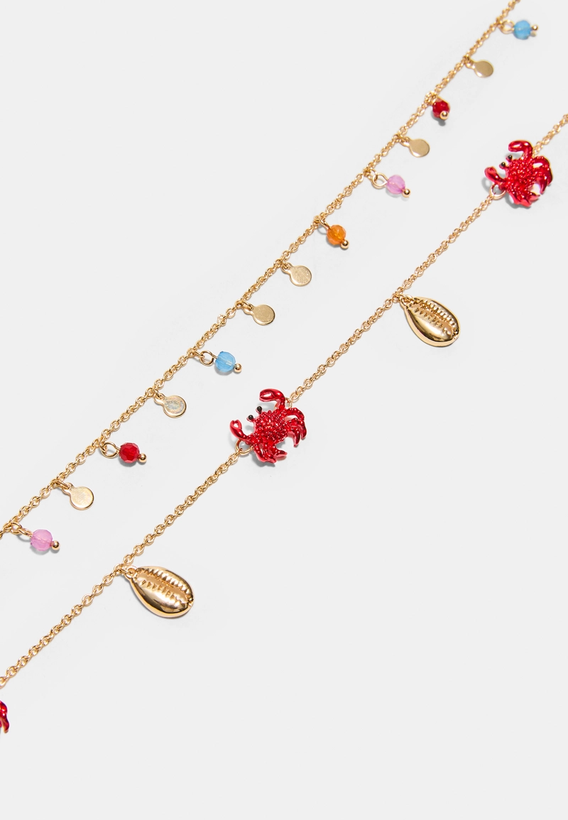 Колье-трансформер с морскими шармами