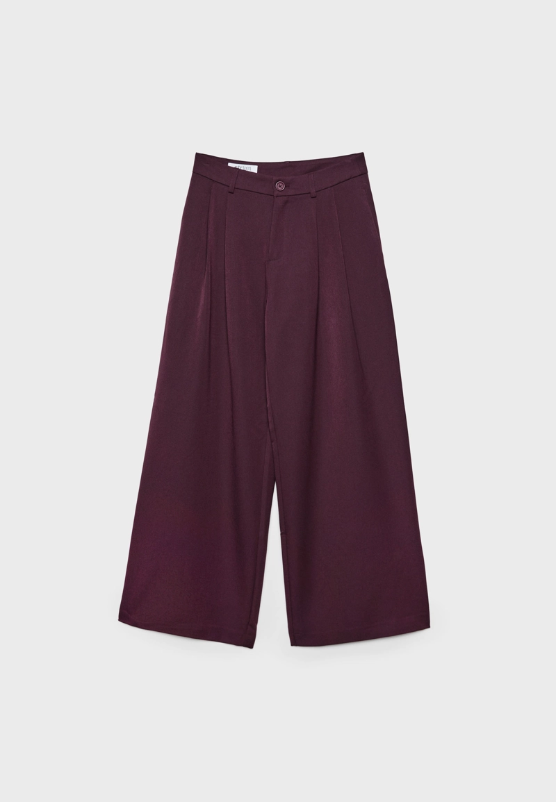 Классические брюки широкого кроя с защипами