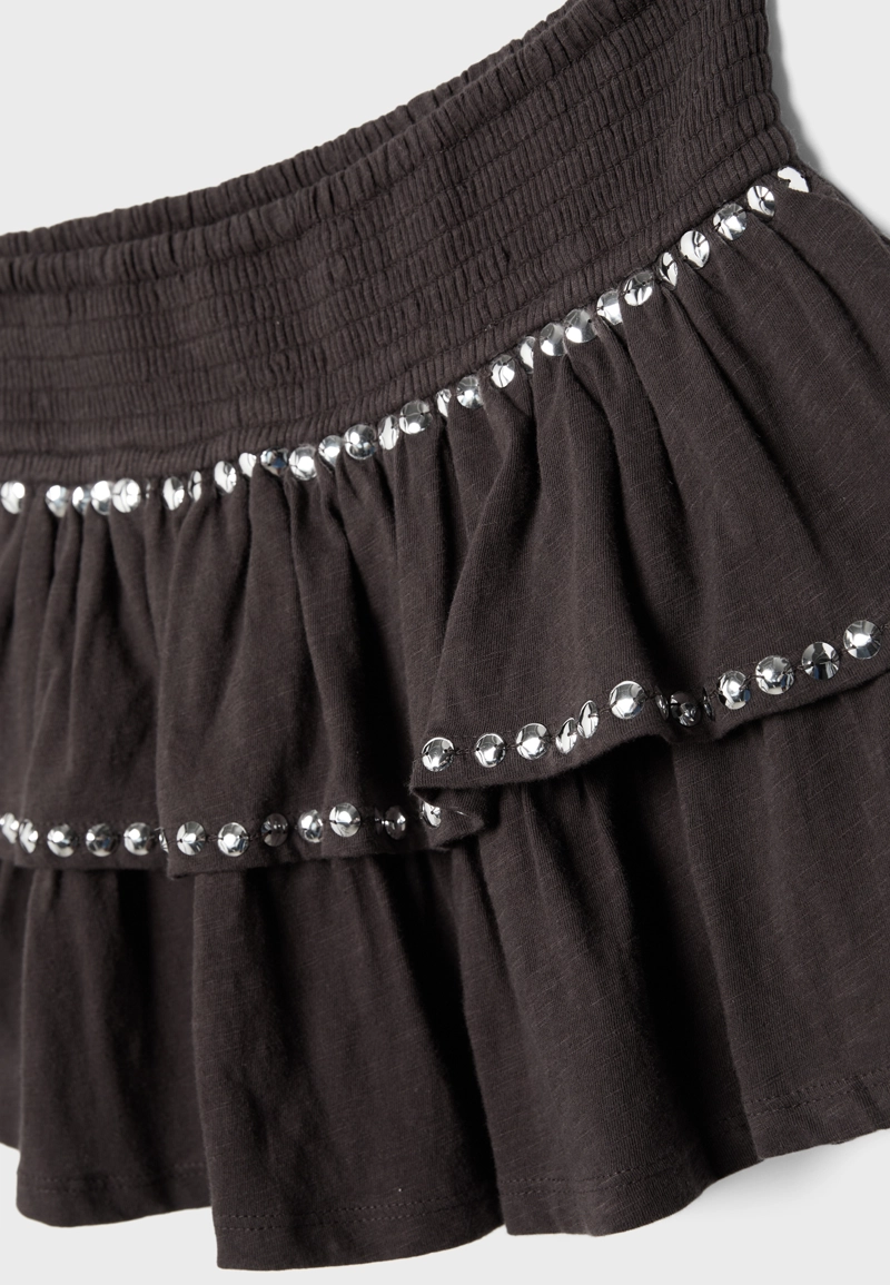 Мини-юбка с воланами и заклепками