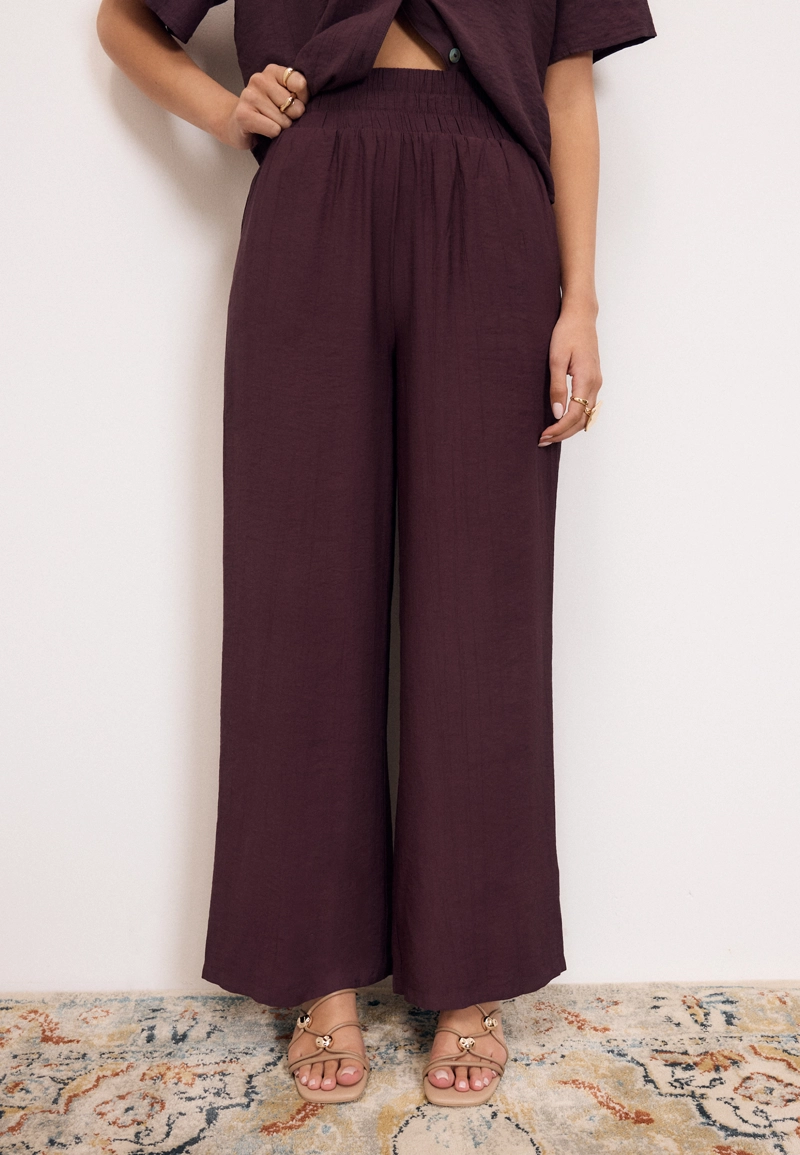 Брюки палаццо с широким поясом