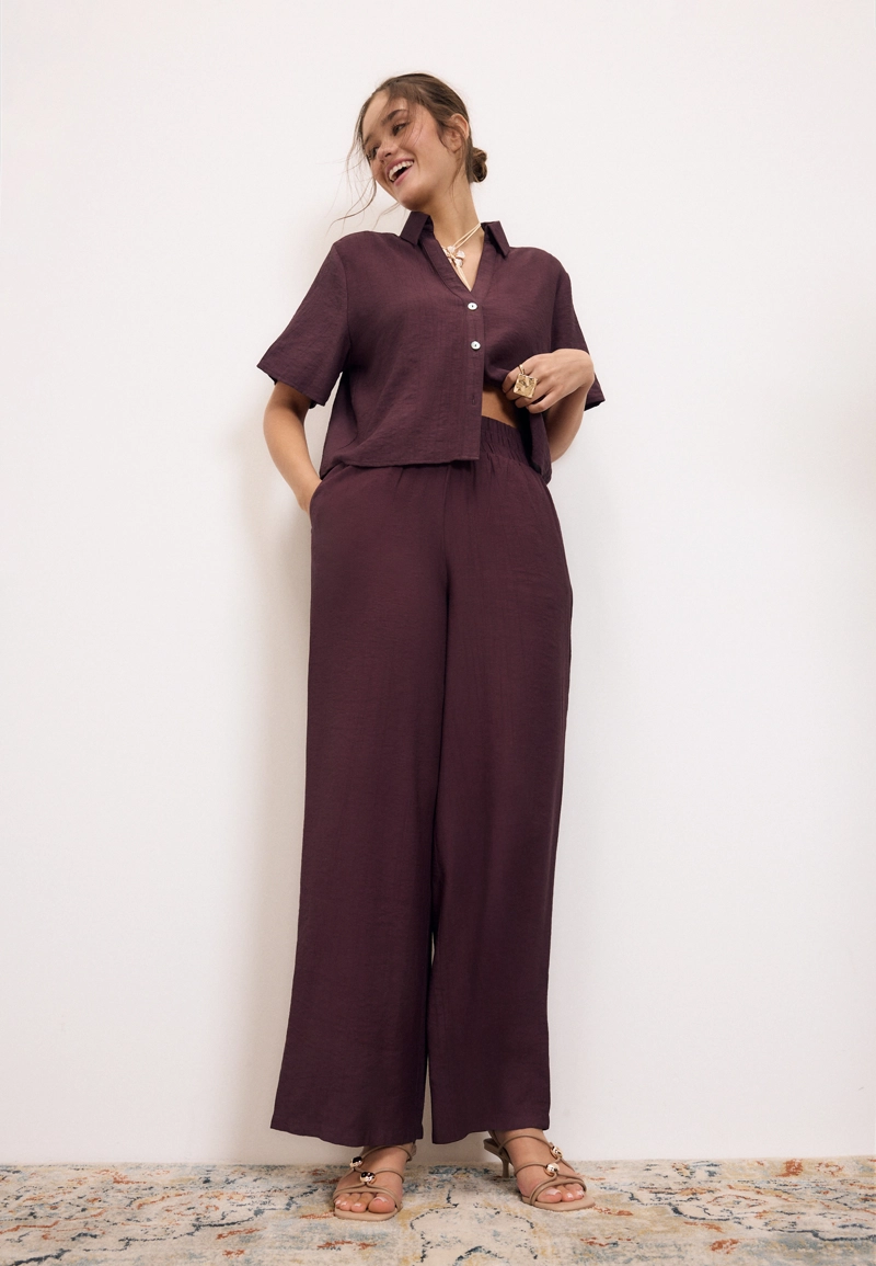 Брюки палаццо с широким поясом