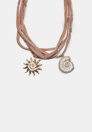 Колье-чокер с подвесками в виде солнца и раковины- Заказать в России