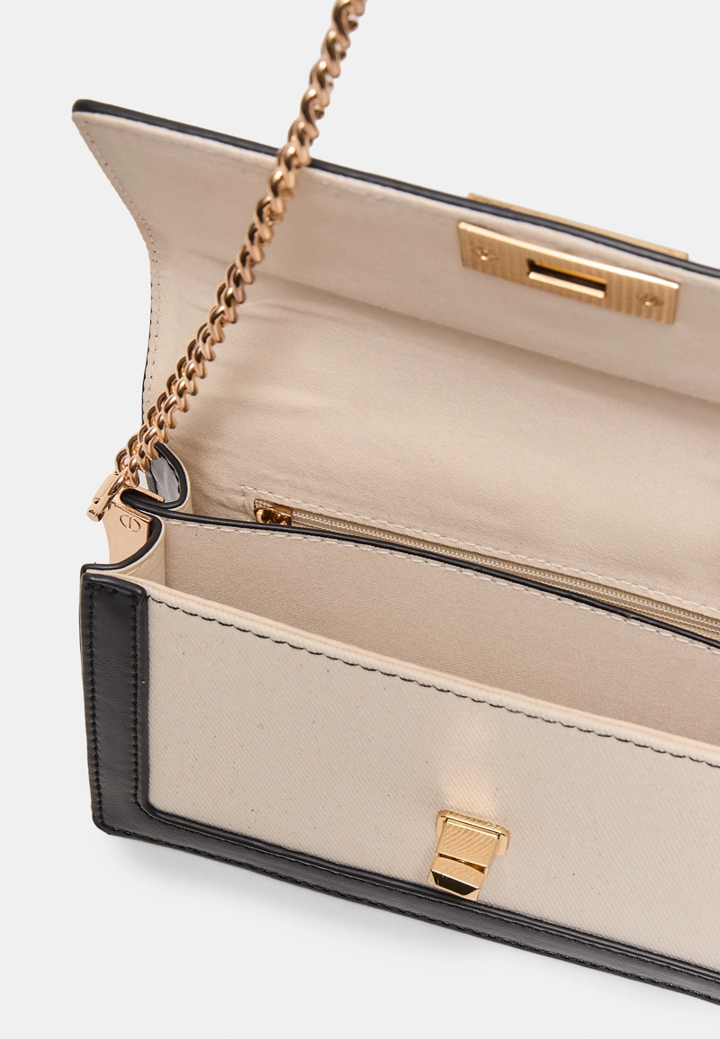 Комбинированная сумка-слинг из канваса